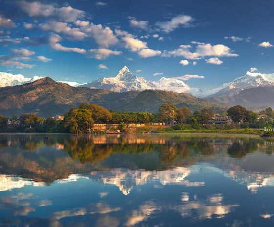 Fly Chitwan to Pokhara : 20 minutes flight (900 m): Pokhara sightseeing: Boating & stroll around Phewa Lake